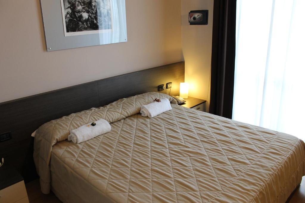Eq Hotel Травальято Номер фото